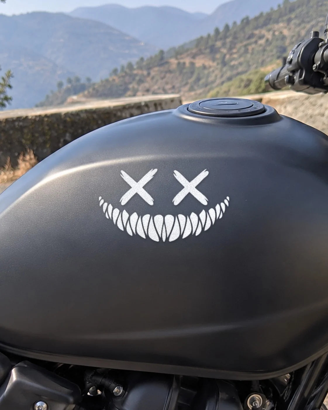 Grin Reaper bike patch in white ink on a bike