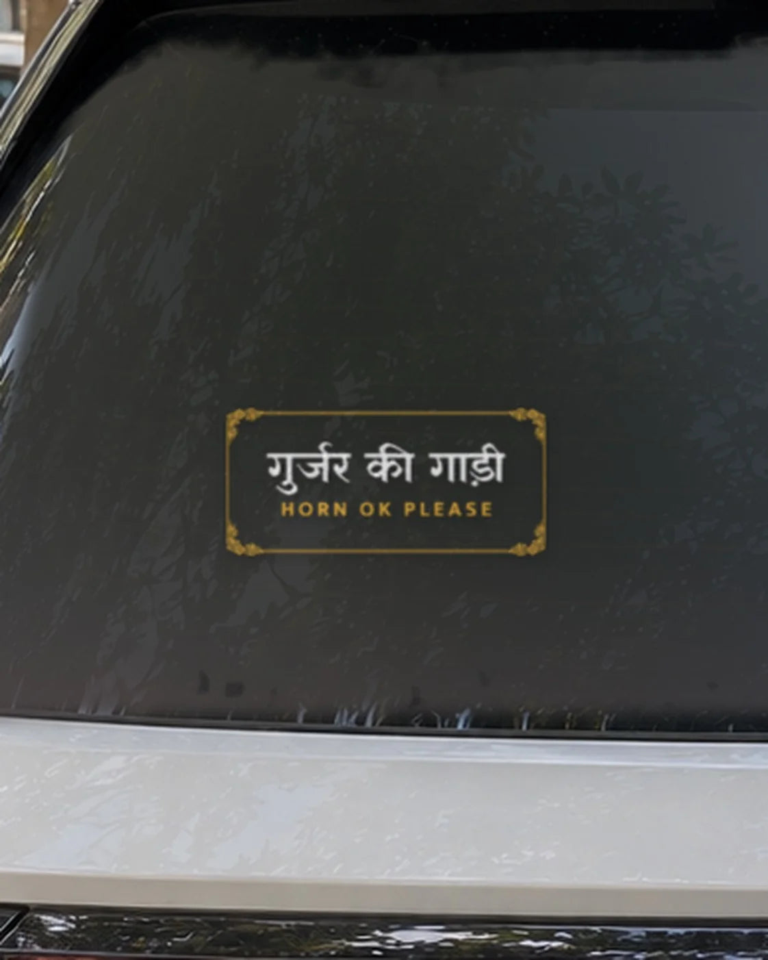Gurjar car patch on a car rear glass