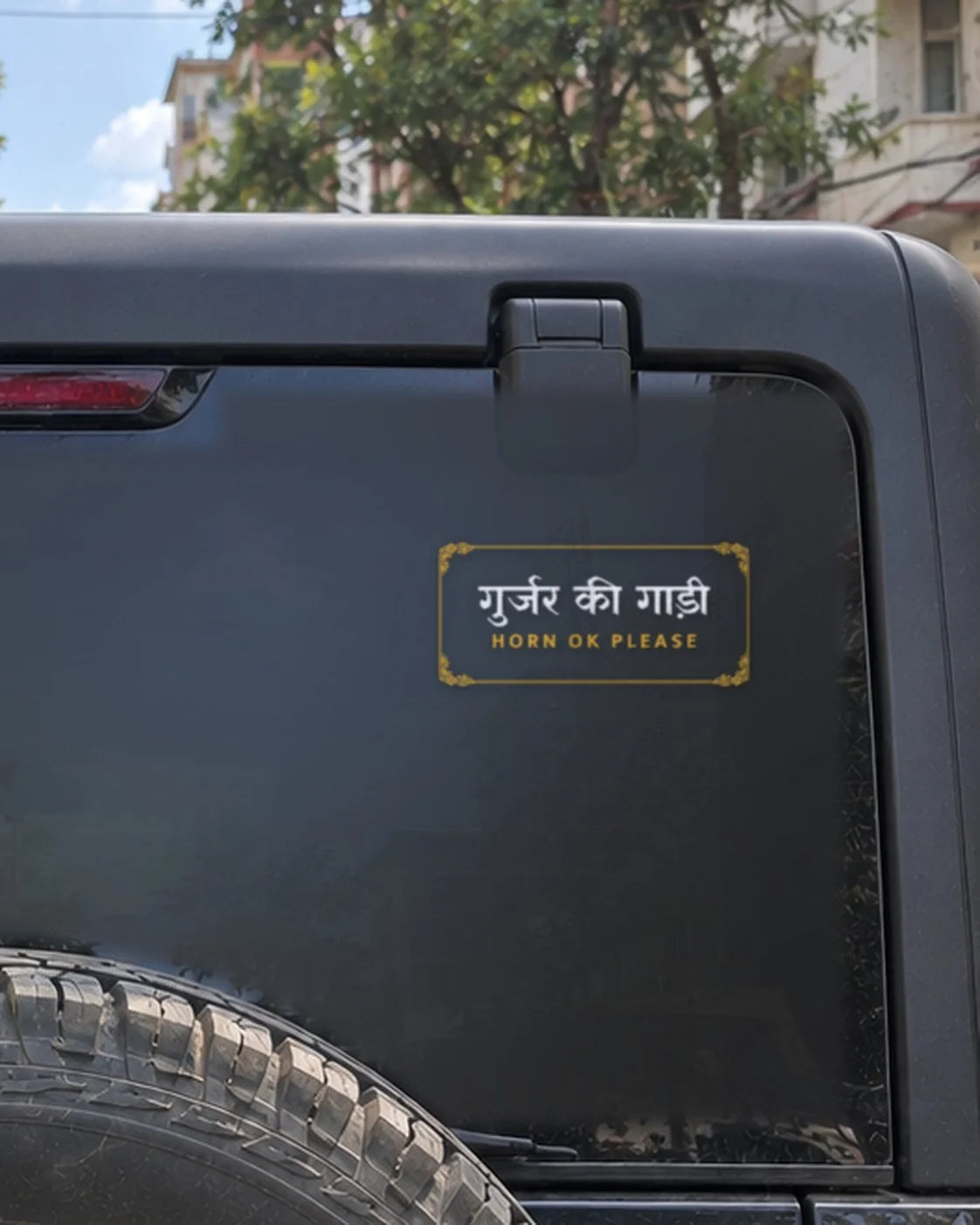 Gurjar car patch on a car rear glass