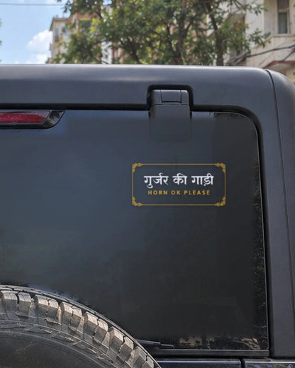 Gurjar car patch on a car rear glass