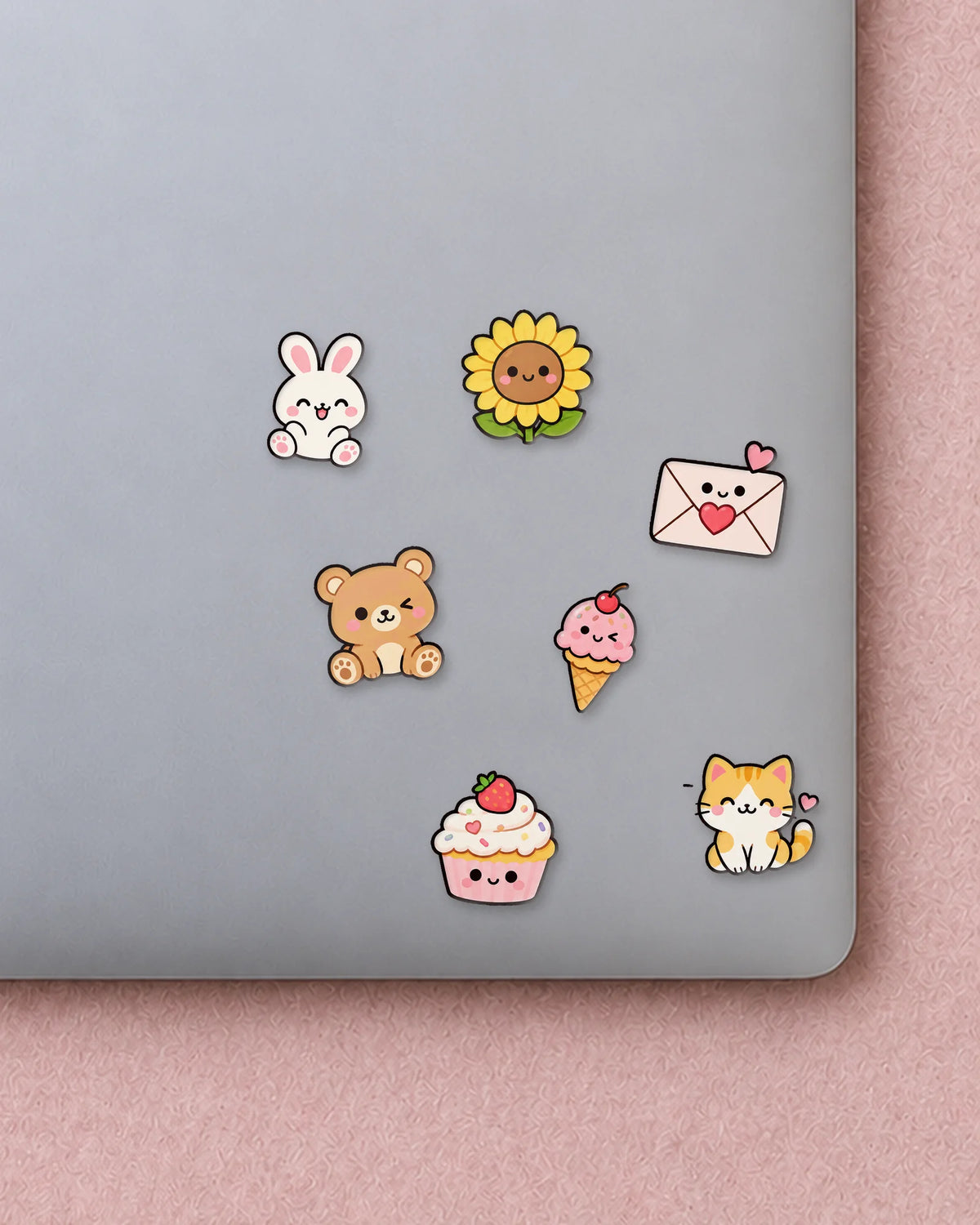 Happy Things mini patches on a laptop