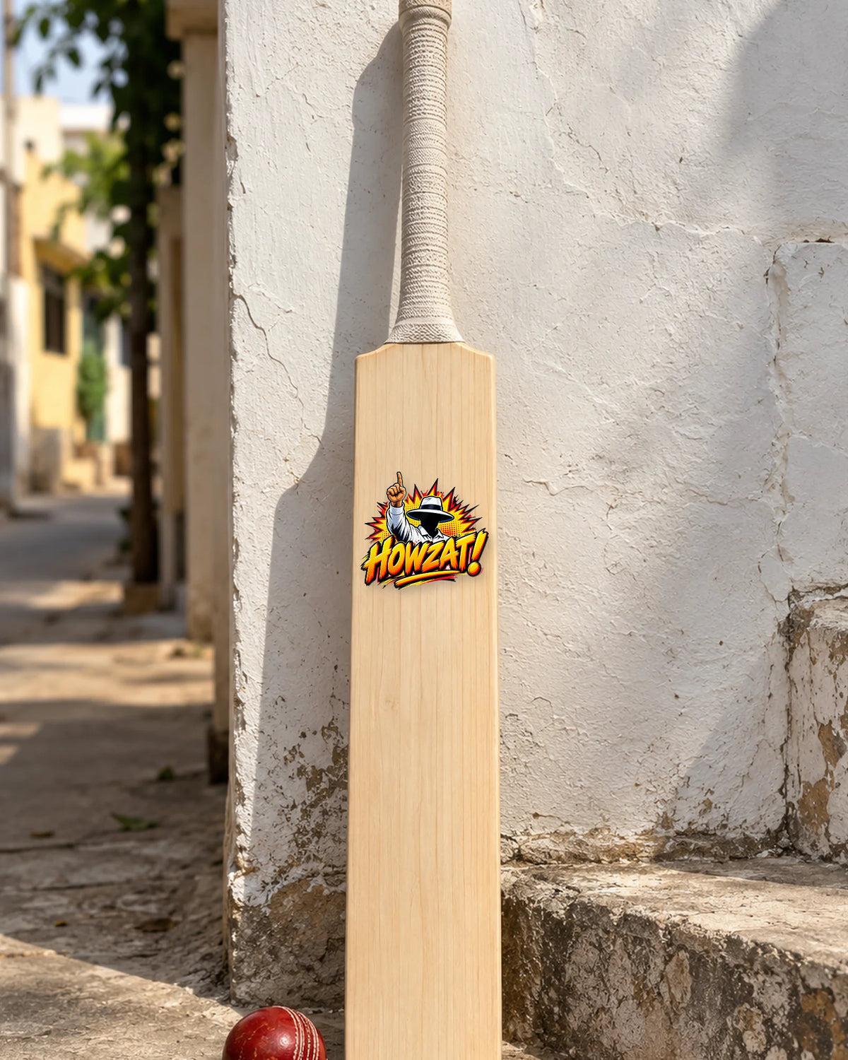 Howzat on a full cricket bat