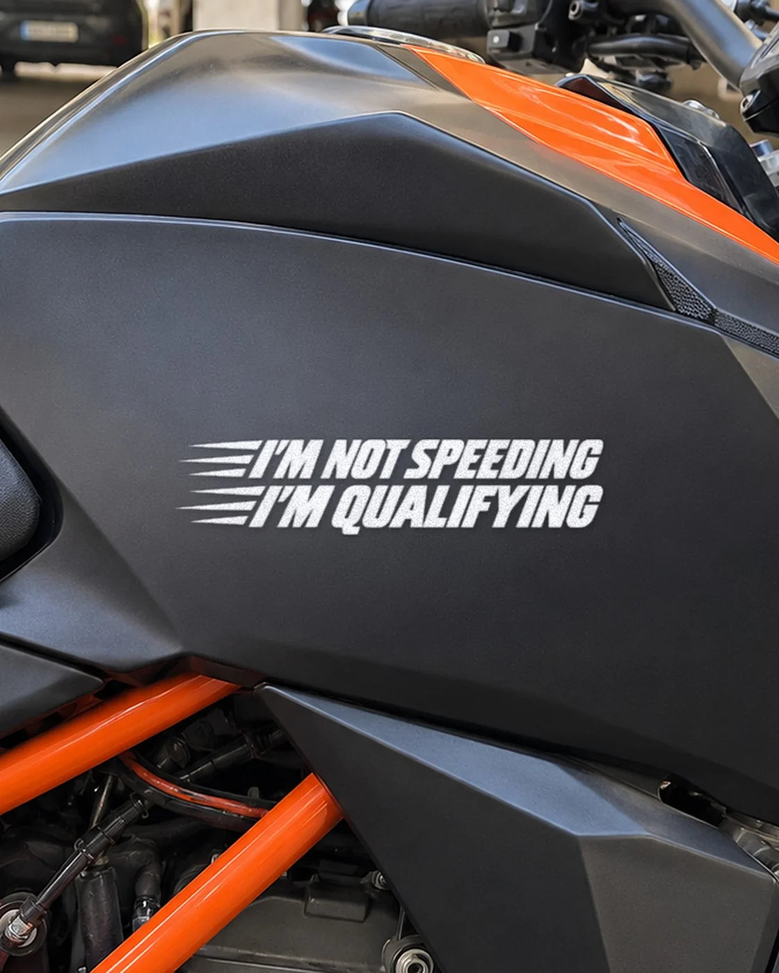 Just Qualifying bike patch in white ink on a bike