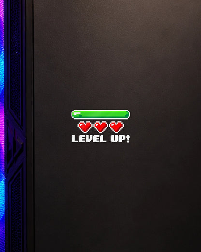 Level Up gamer patch in white ink on a gaming PC cabinet