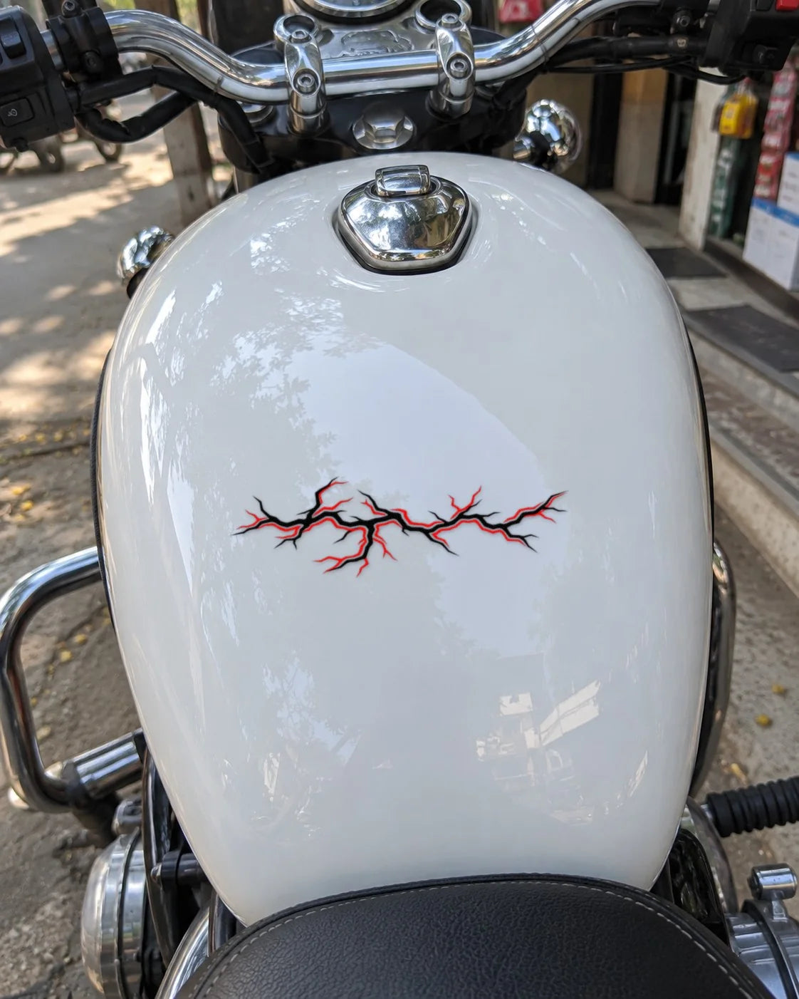 Lightning Strike bike patch in black ink on a bike