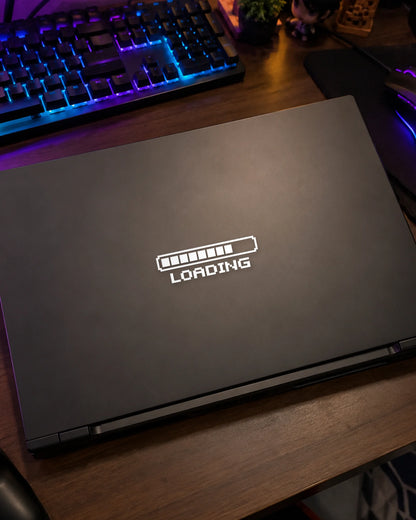 Loading gamer patch in white ink on a gaming laptop