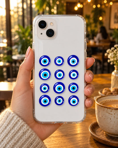 Nazar Pattern on a phone at a cafe