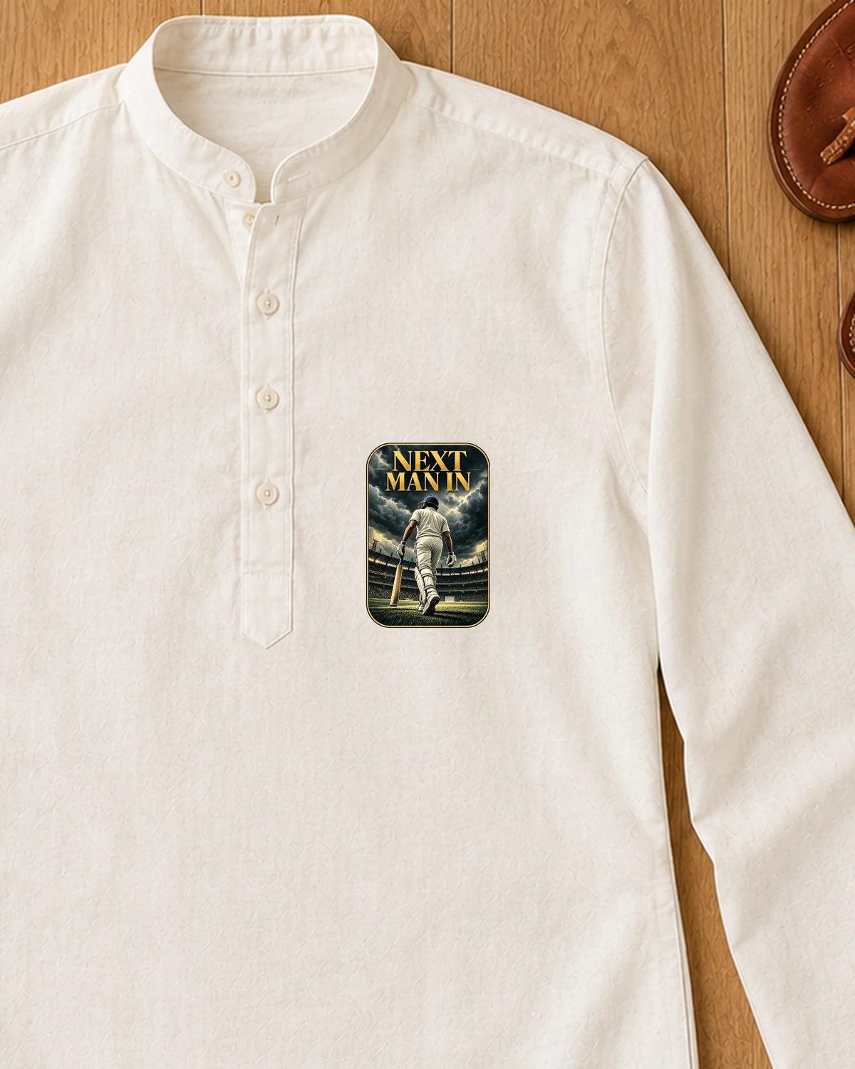Next Man In iron-on patch on clothes