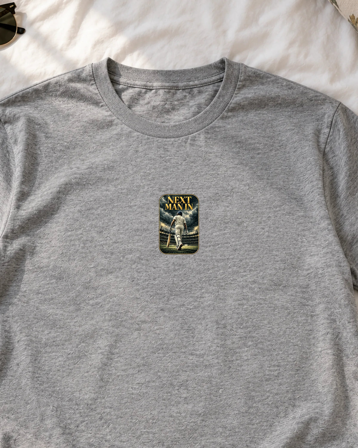 Next Man In iron-on patch on clothes