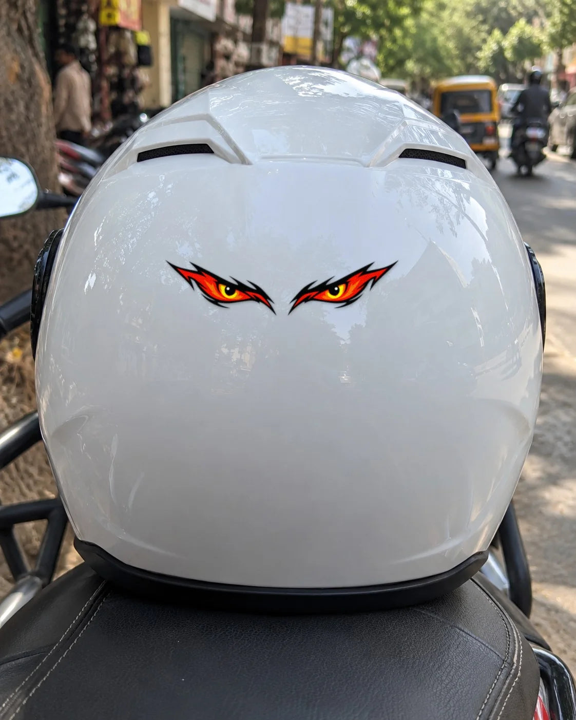Night Eyes bike patch on a helmet