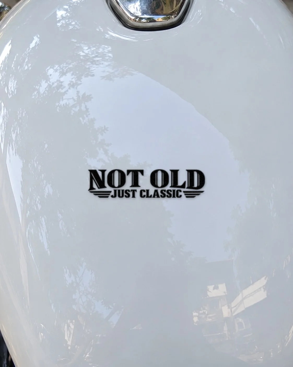 Not Old Just Classic bike patch in black ink on a bike