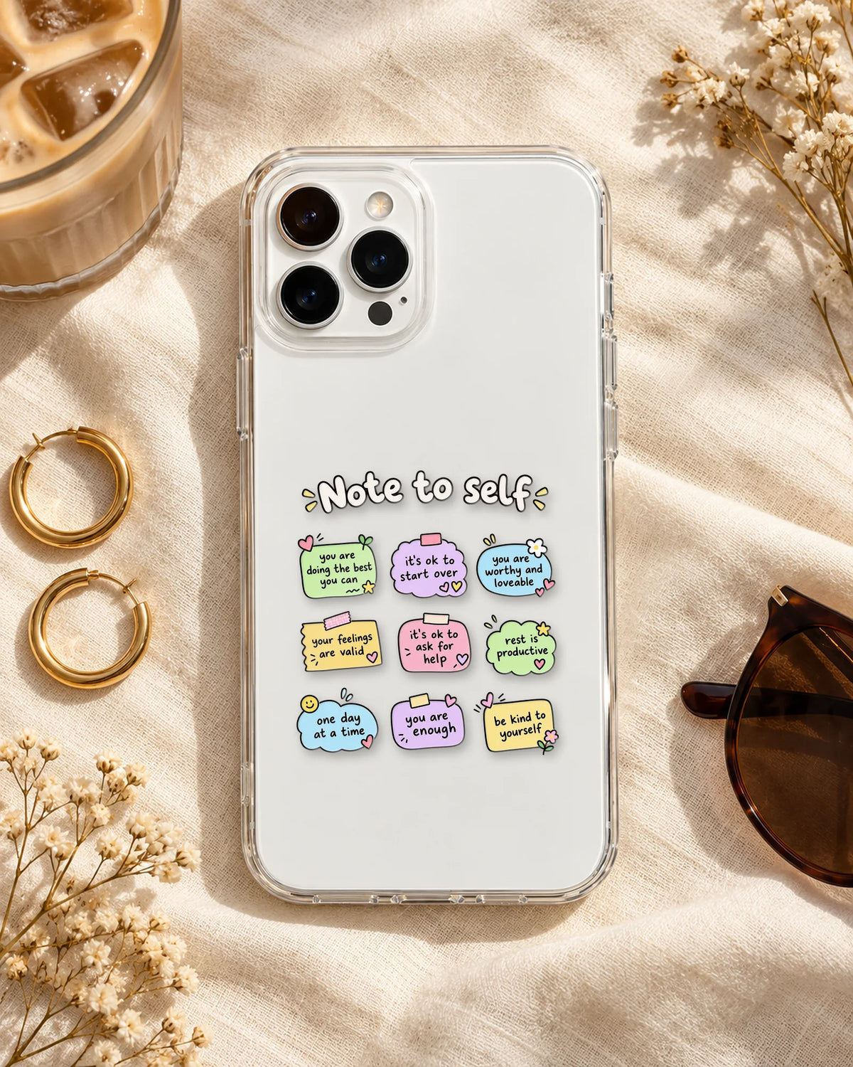 Note To Self pieces arranged on a phone