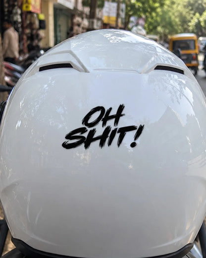 Oh Shit! bike patch in black ink on a helmet
