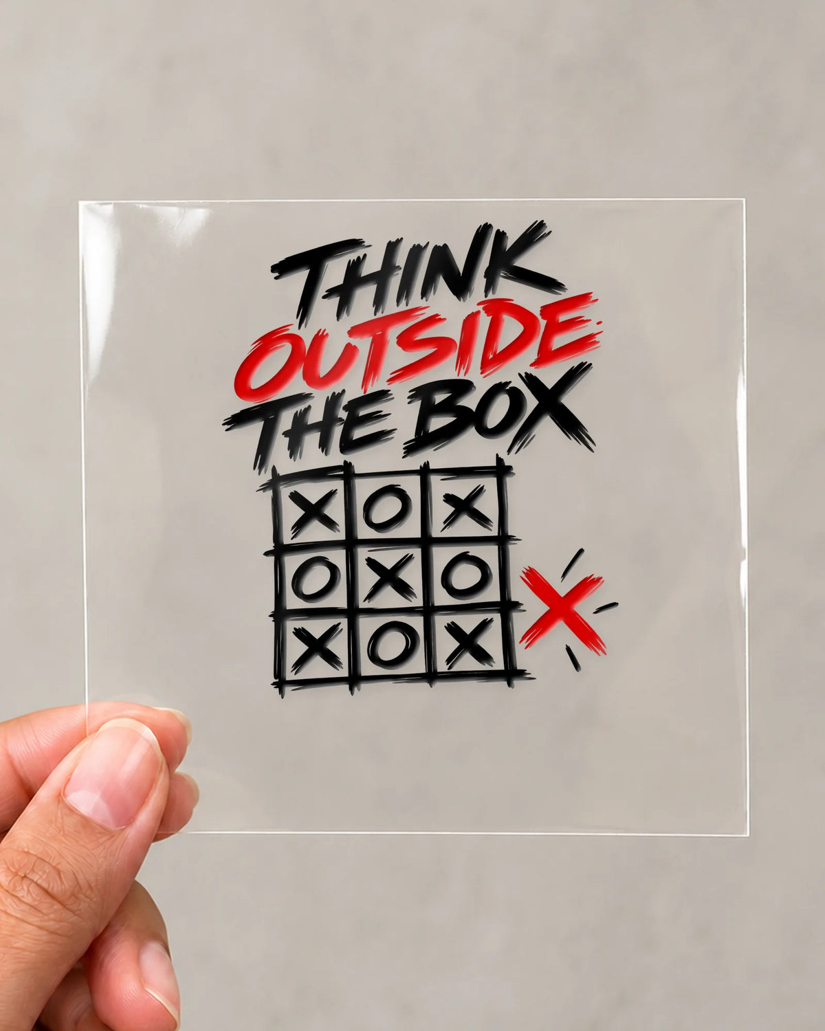 Outside The Box hard surface patch on clear film