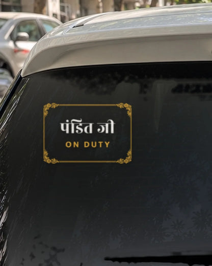 Pandit Ji car patch on a car rear glass