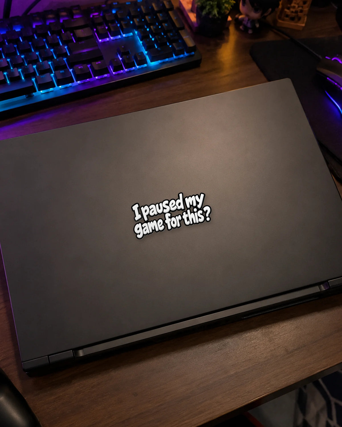 I Paused My Game For This? gamer patch on a gaming laptop