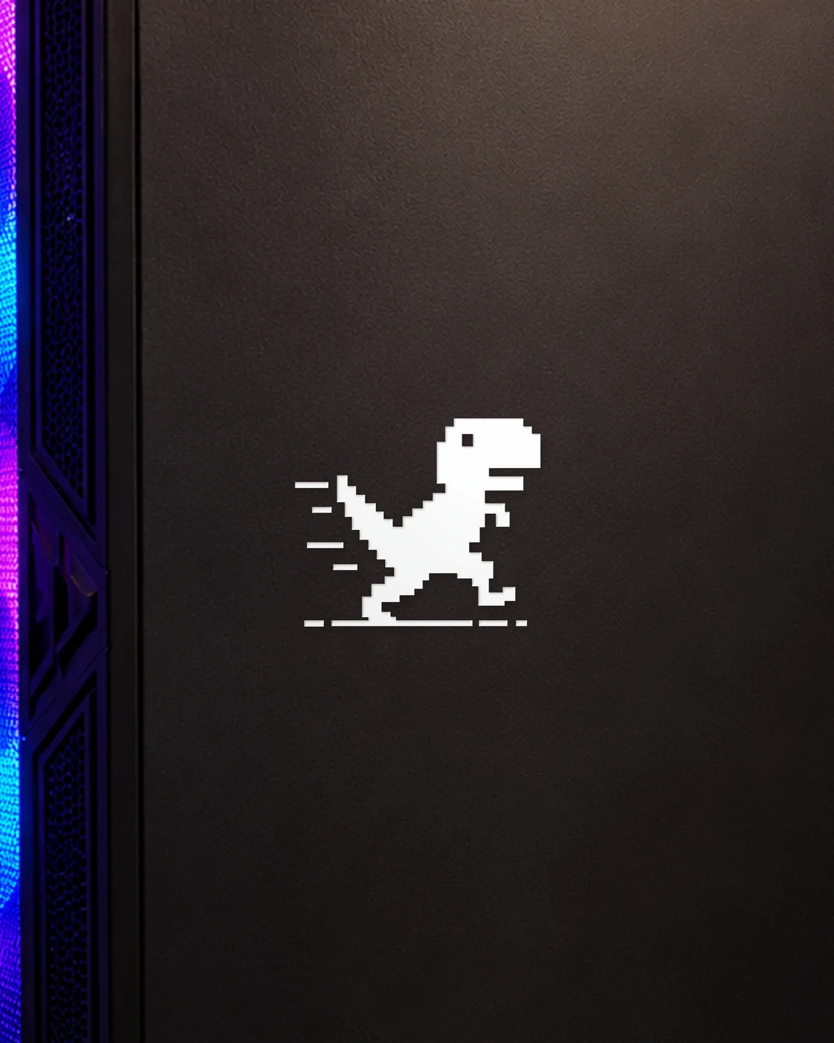 Pixel Dino gamer patch in white ink on a gaming PC cabinet