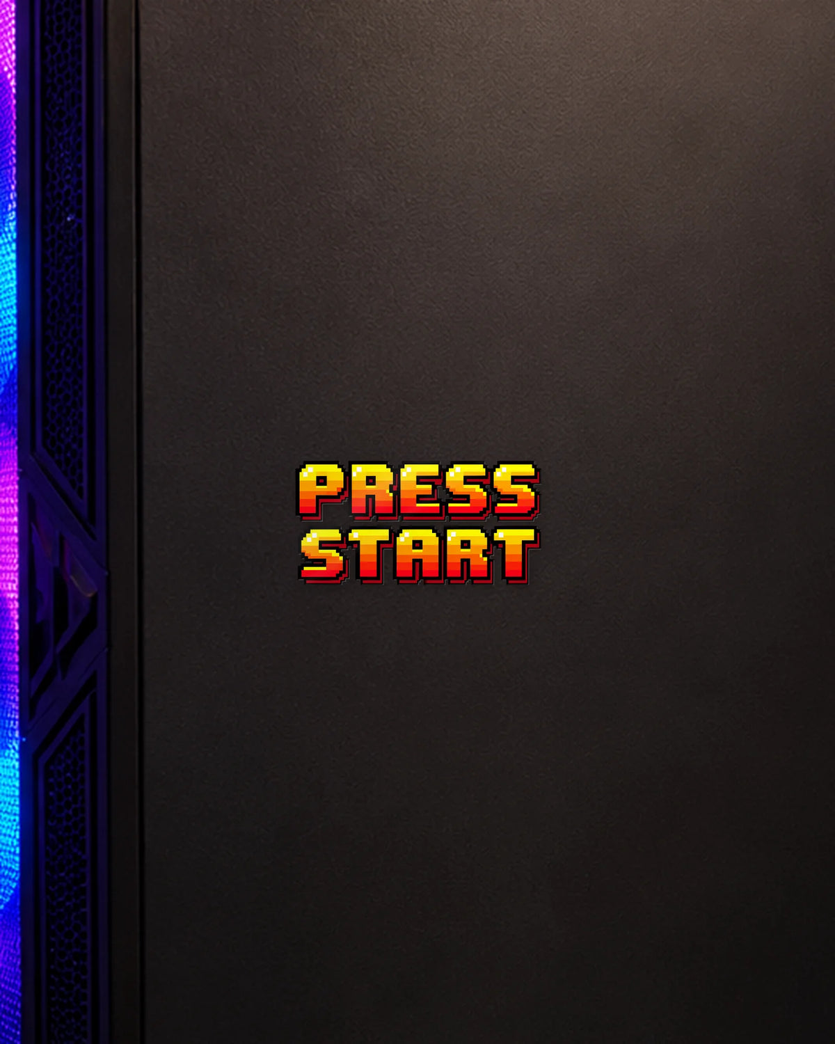 Press Start gamer patch on a gaming PC cabinet