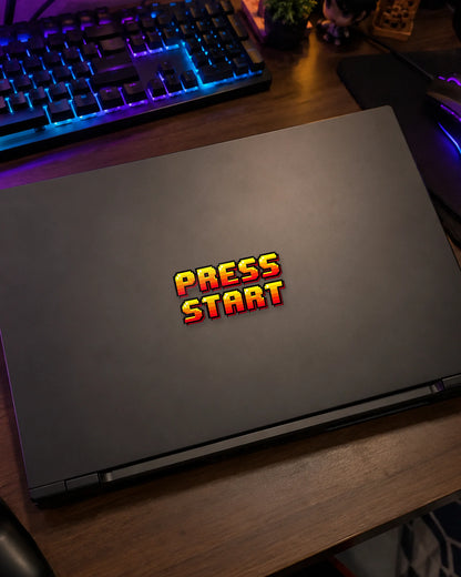 Press Start gamer patch on a gaming laptop