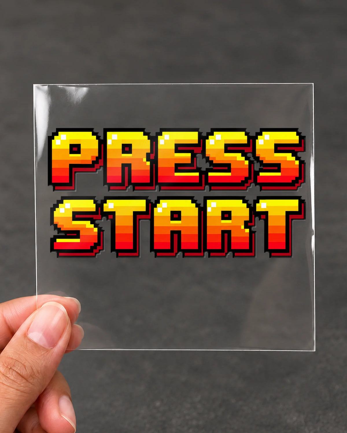 Press Start gamer patch on clear film