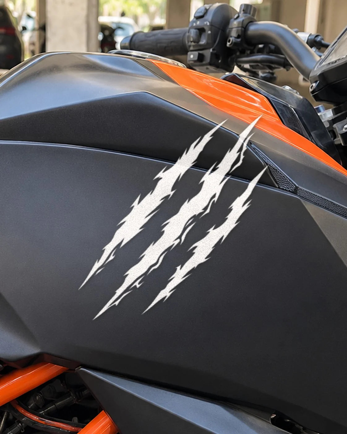Raptor Rip bike patch in white ink on a bike