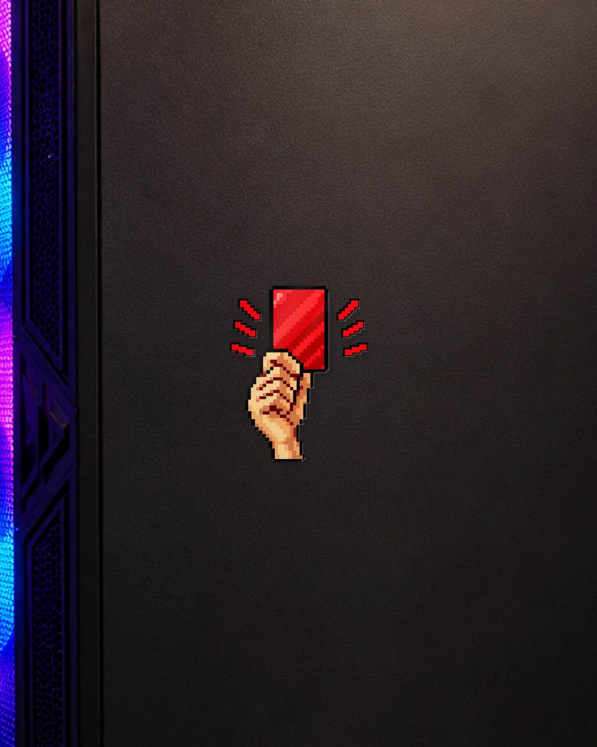 Red Card gamer patch on a gaming PC cabinet