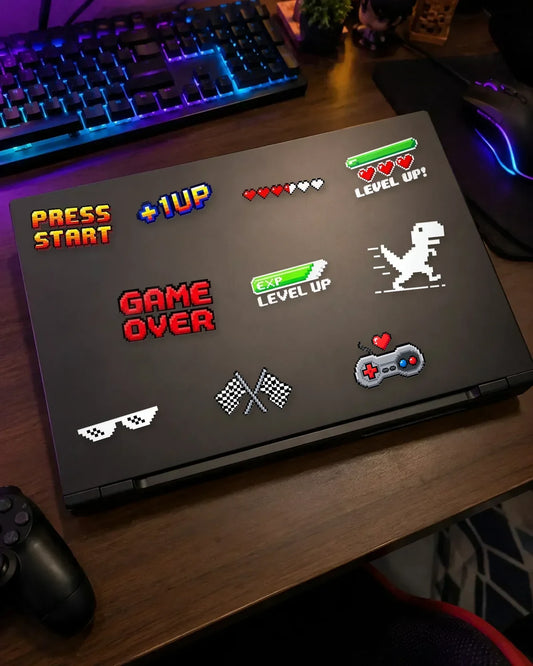 Retro Arcade Pack in white ink: 10 gamer patches on a gaming laptop