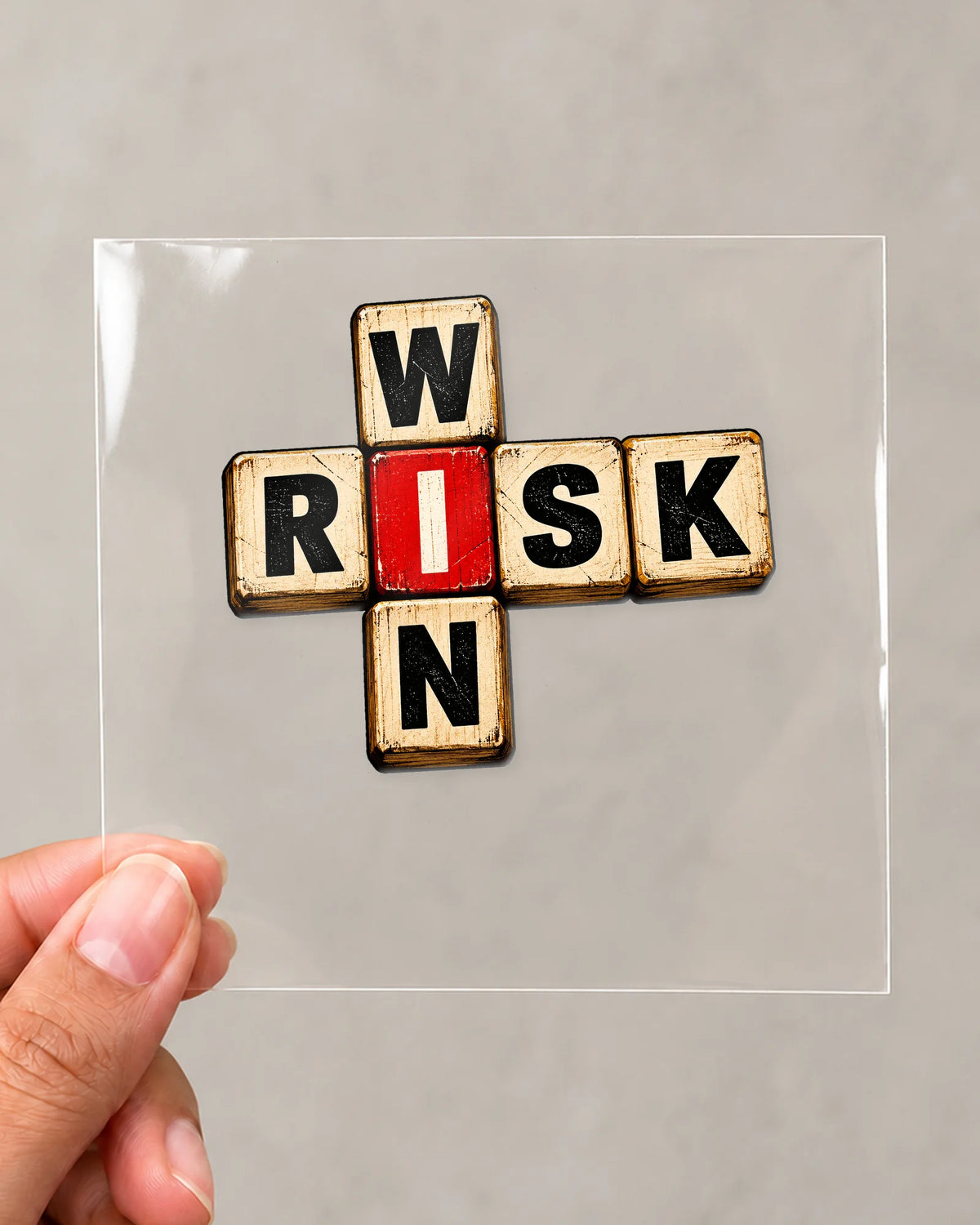 Risk Wins hard surface patch on clear film