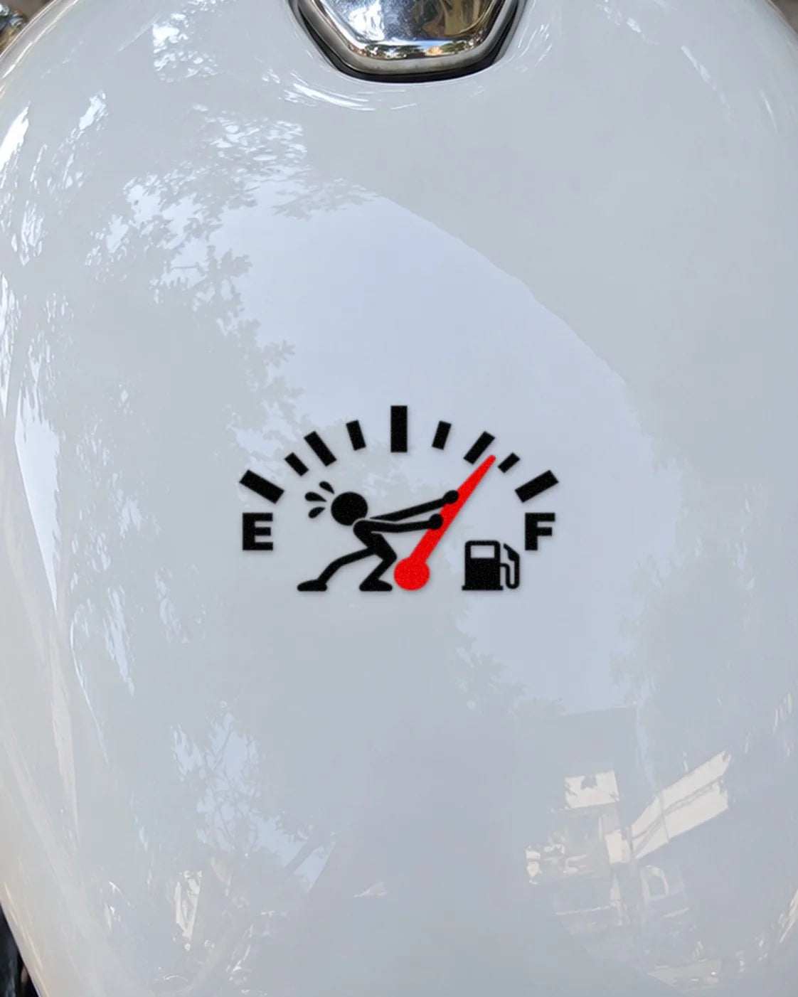 Empty Tank Struggle bike patch in black ink on a bike