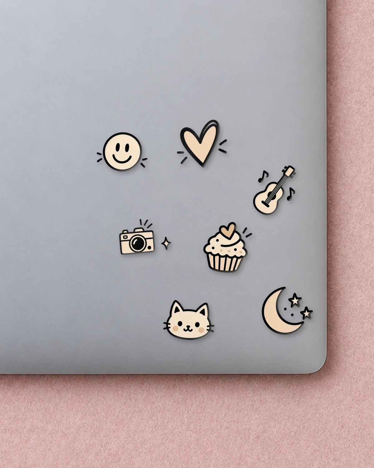 Tiny Doodles mini patches on a laptop