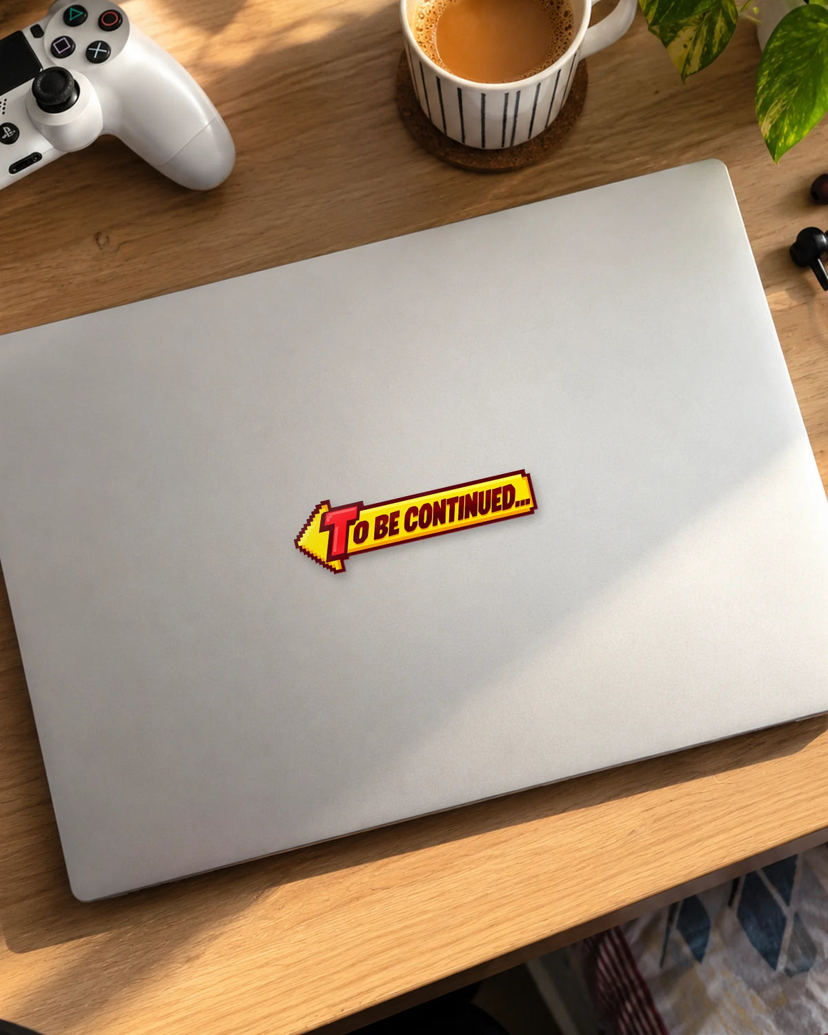 To Be Continued gamer patch on a laptop