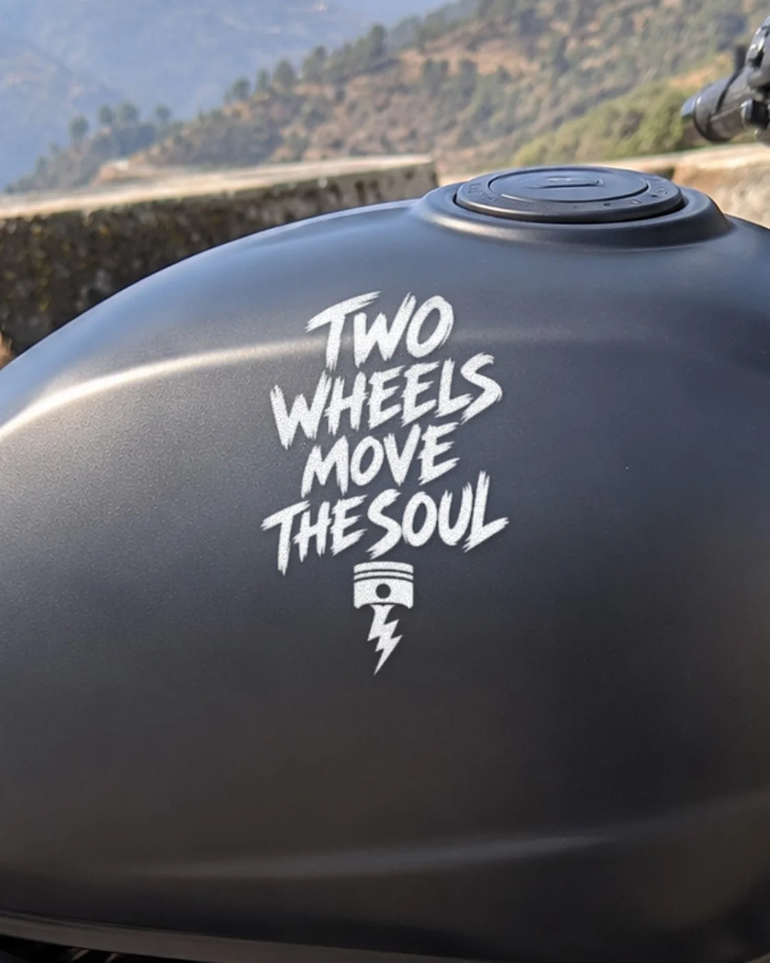 Two Wheels Move the Soul bike patch in white ink on a bike
