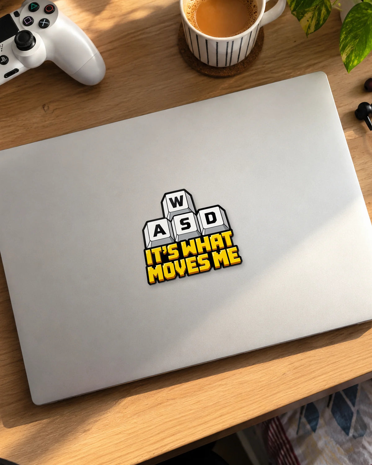 WASD It's What Moves Me gamer patch on a laptop