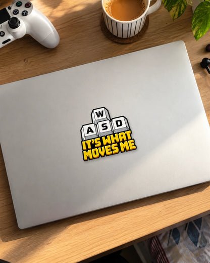 WASD It's What Moves Me gamer patch on a laptop