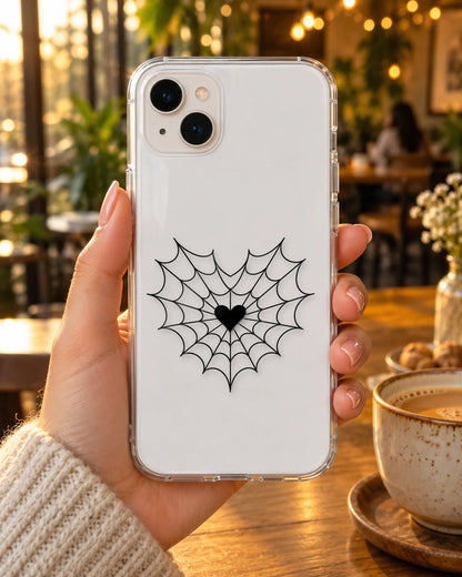 Web Of Love on a phone at a cafe