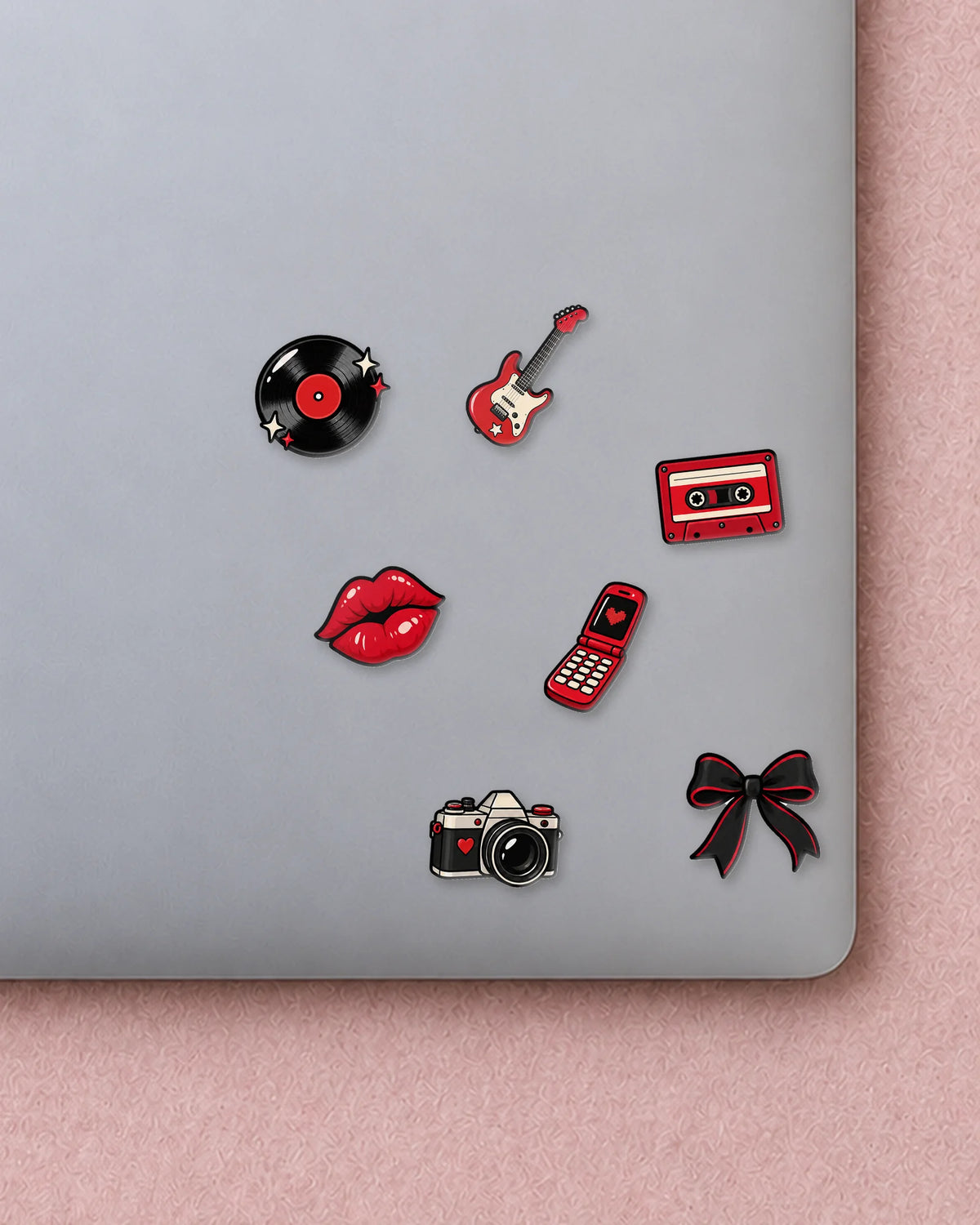 Y2K Grunge mini patches on a laptop