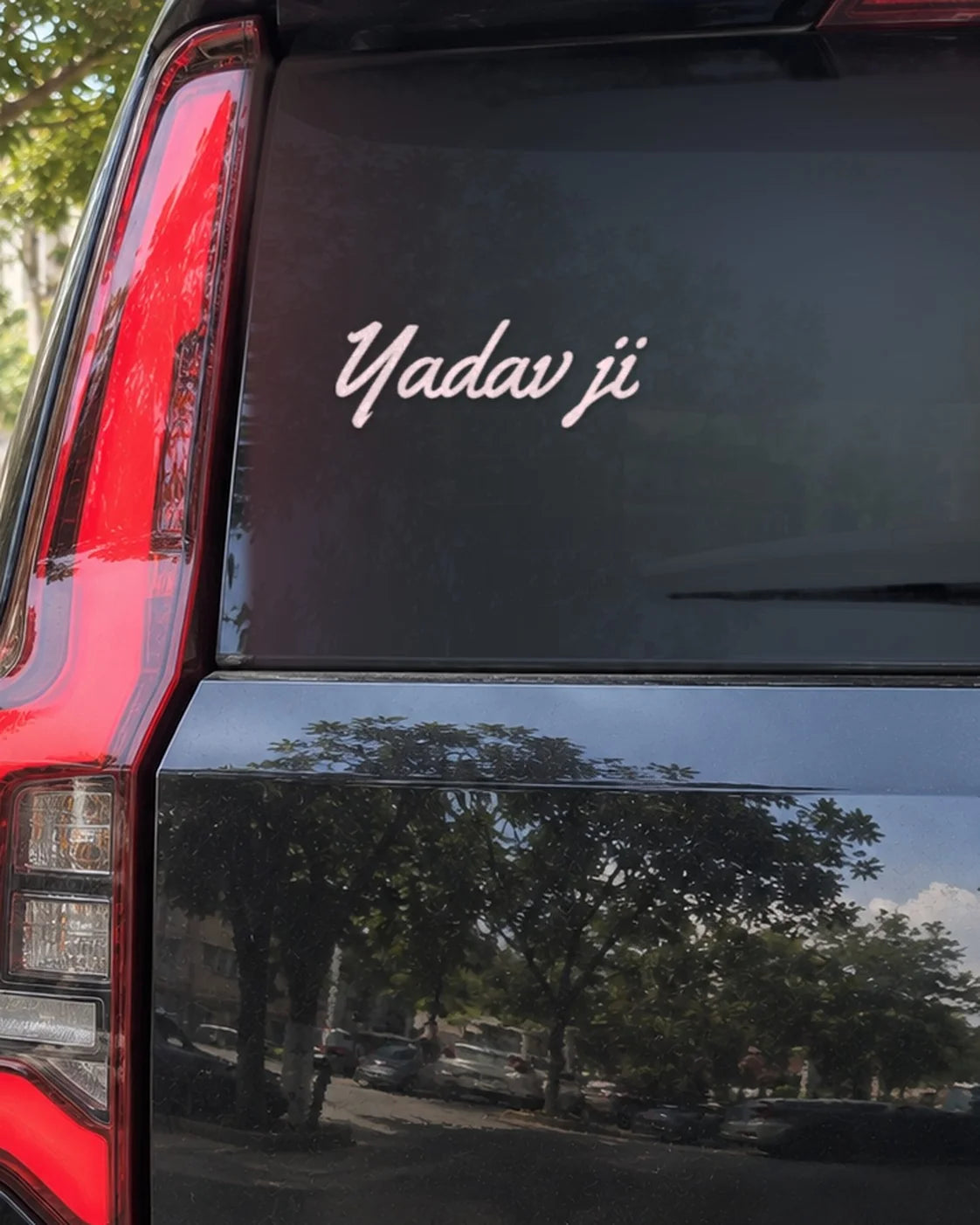 Yadav car patch on a car rear glass