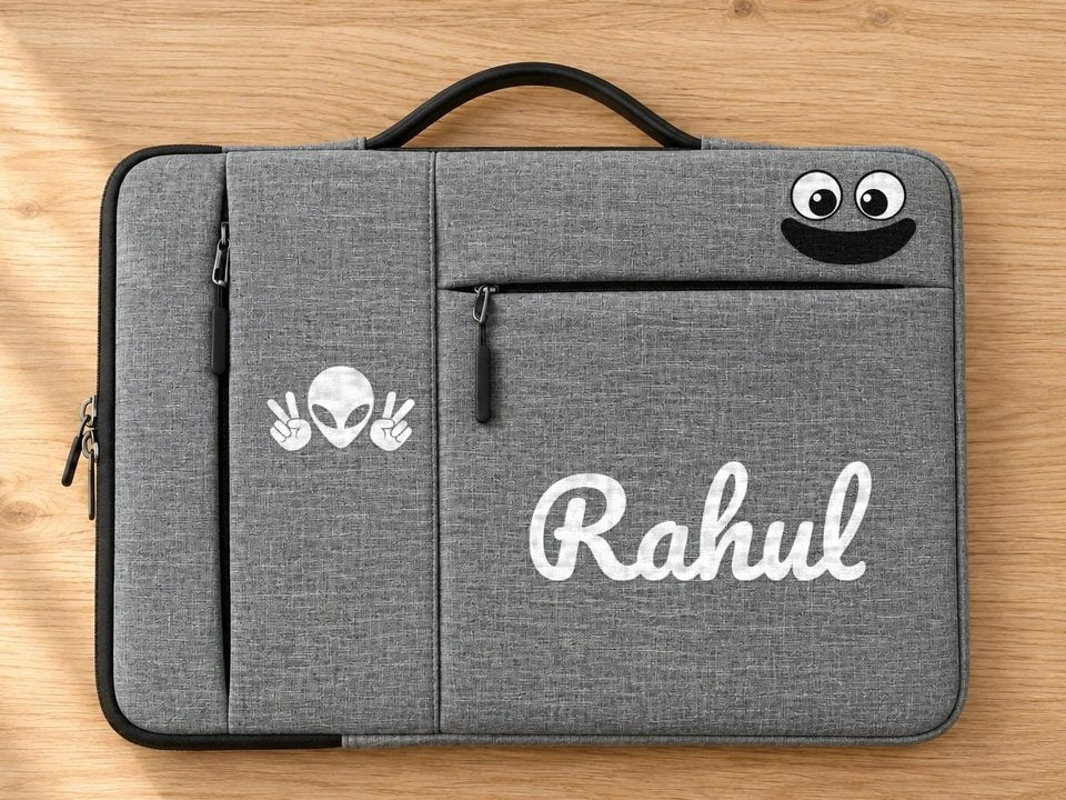 A grey laptop sleeve with patches pressed on